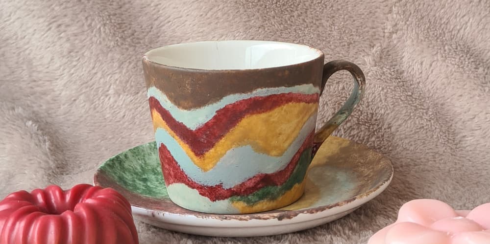colored cup and plate