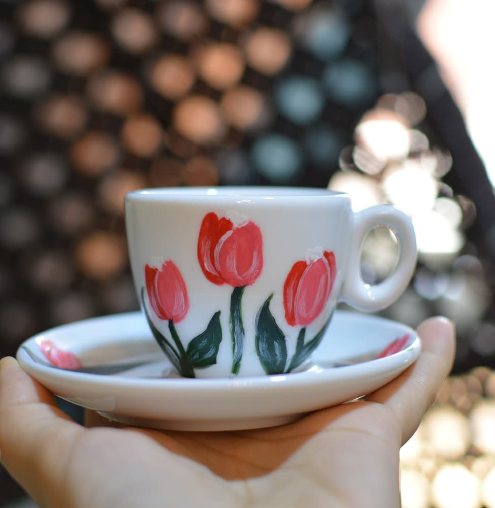 Tulips Painted porcelain mug with painted plate.