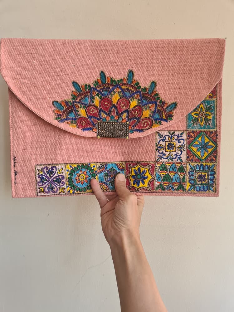 Pink handpainted envelope supported fabric canvas clutch bag with attached accessories 