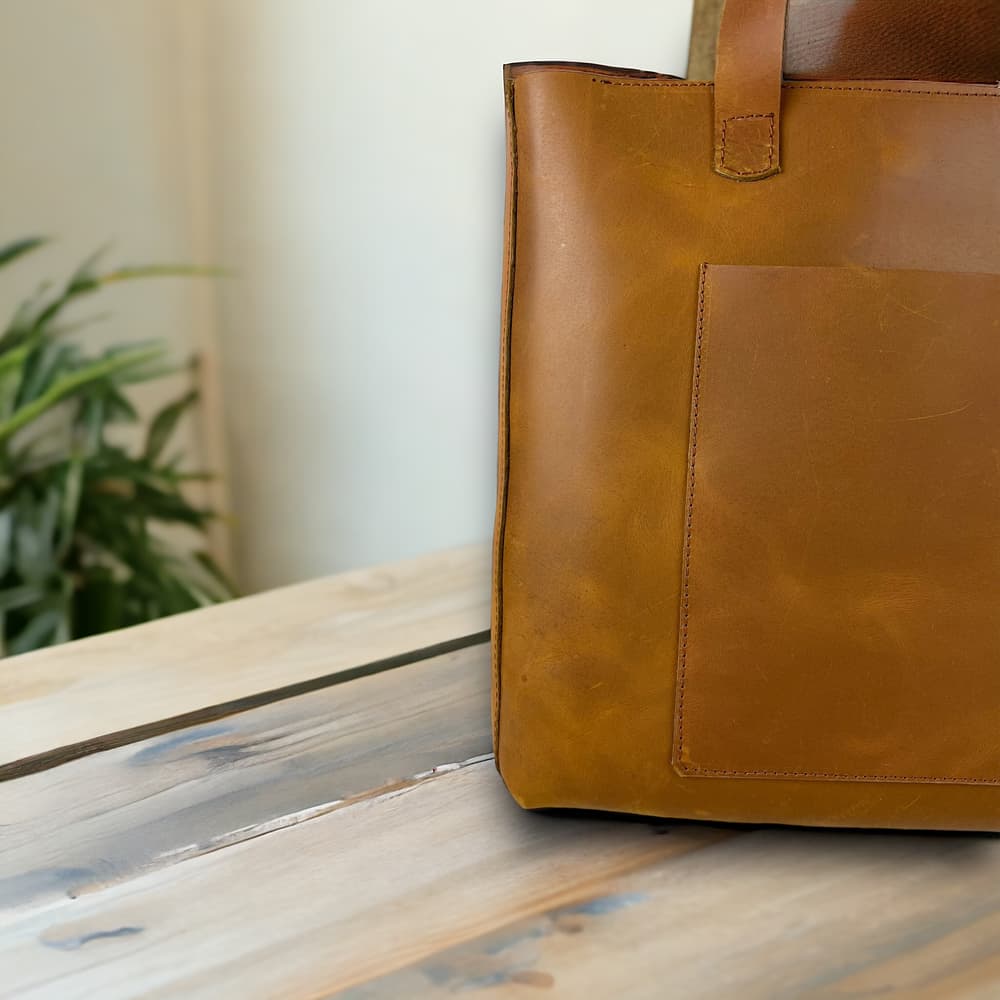 Handmade genuine leather havan tote bag with key holder and cardholder .