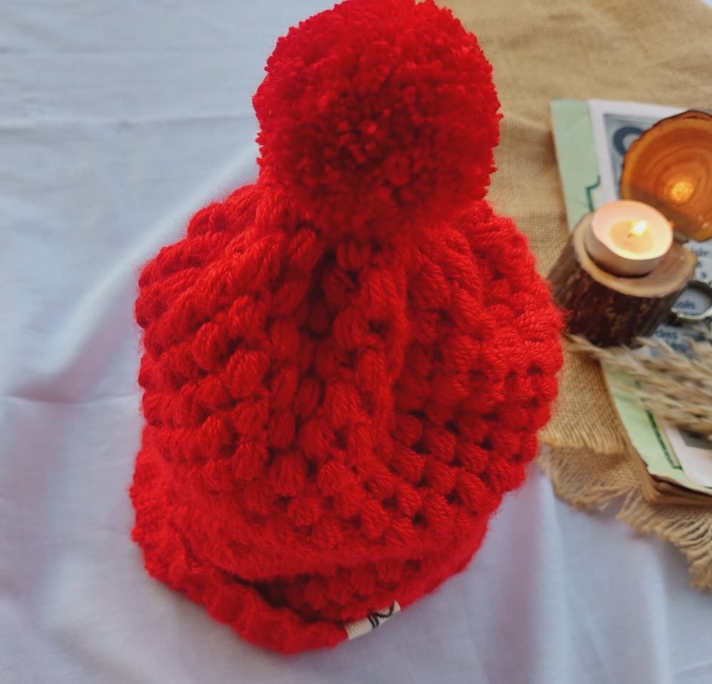 Red puff crochet beanie
