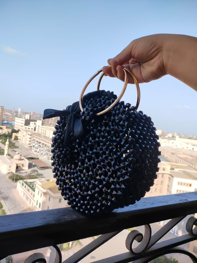 A bag of black crystal beads  