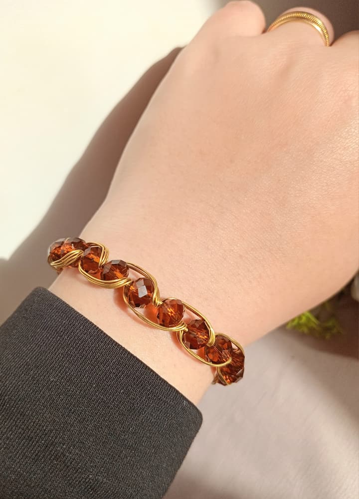 Copper bracelet with brown crystal beads