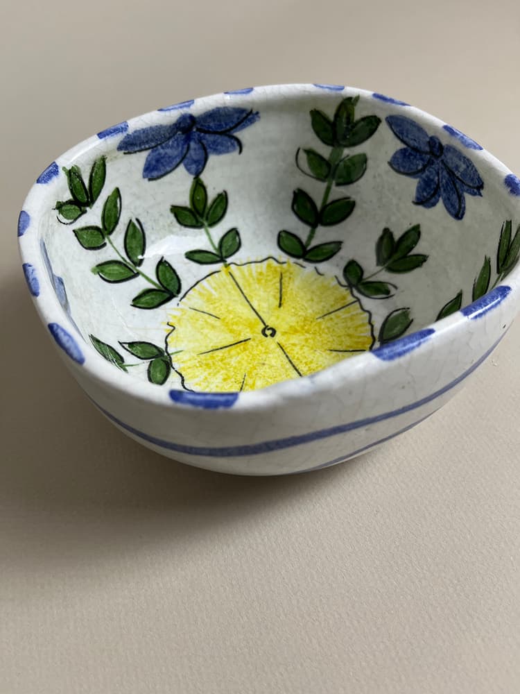 Yellow flower pottery bowl