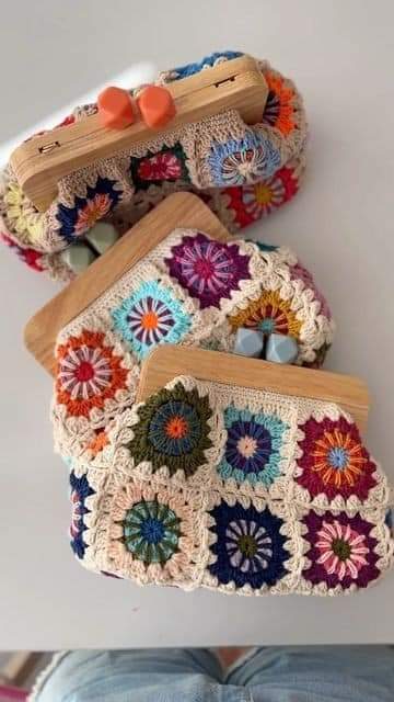 A crochet bag with a wood rim.