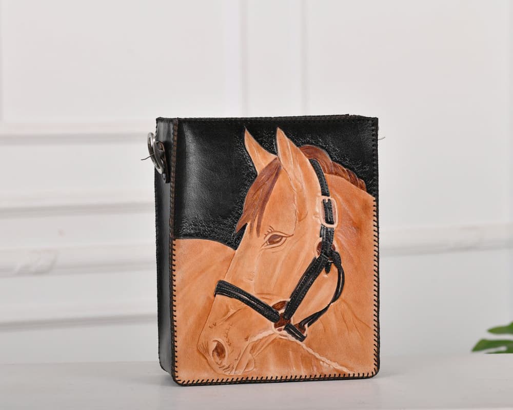 donza horse carving black bag