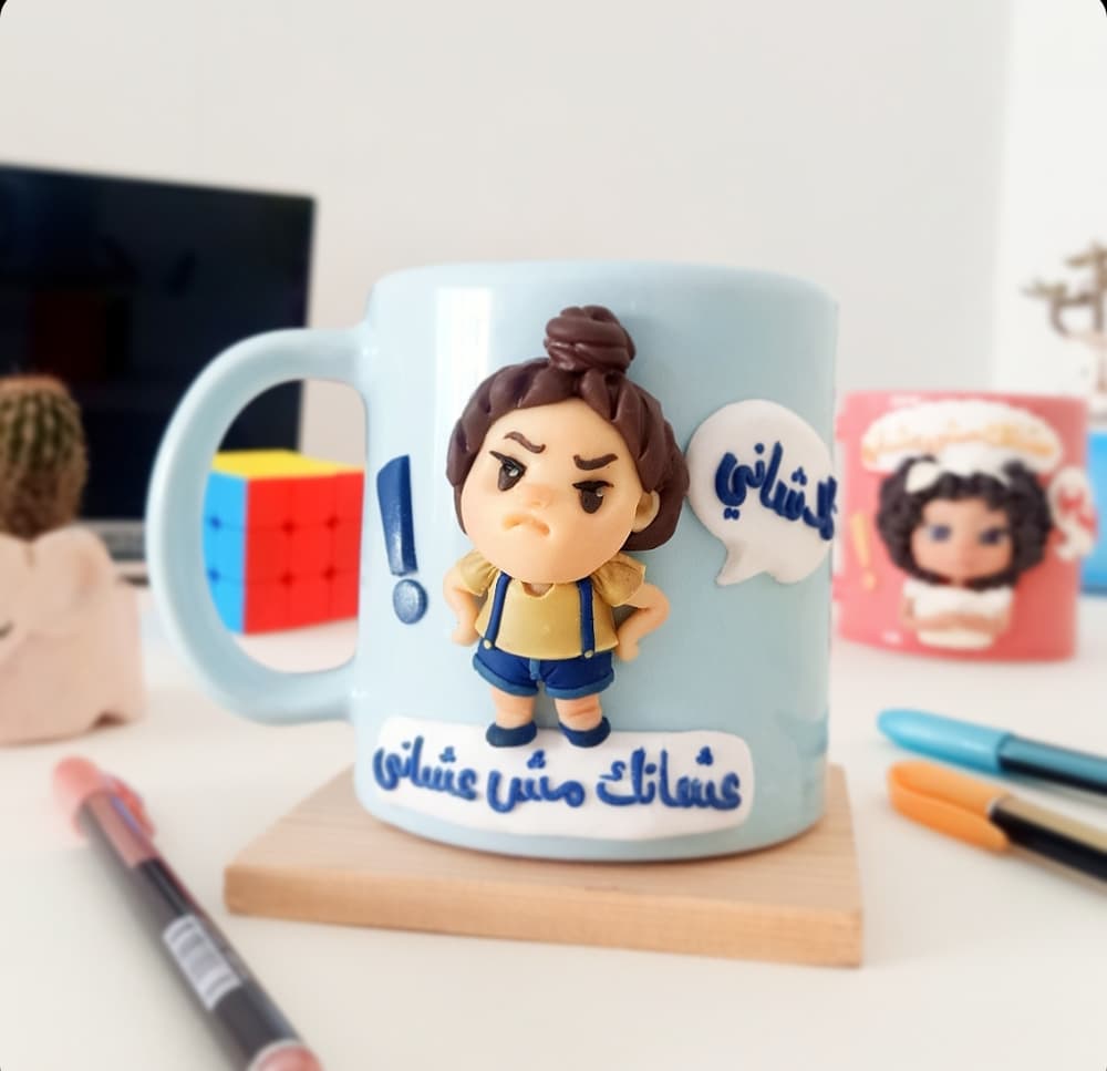 Angry girl on blue mug 