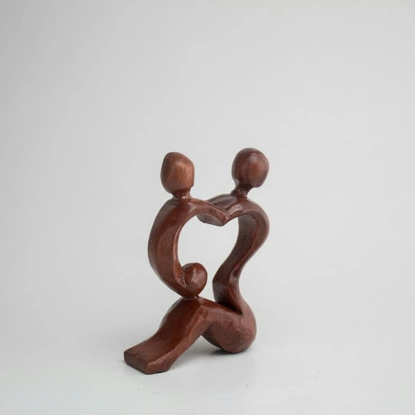 "Love Story" sculpture on beech wood