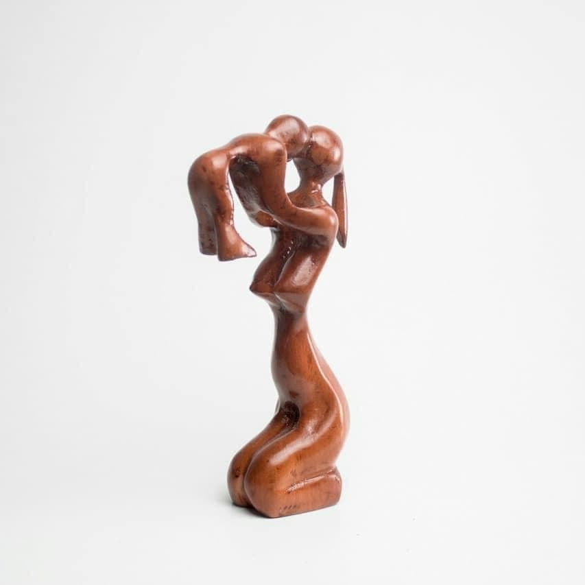 "Love Story" sculpture on beech wood