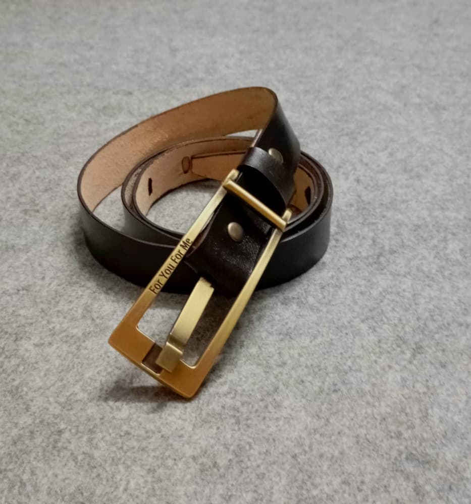 Plain black belt with copper buckle