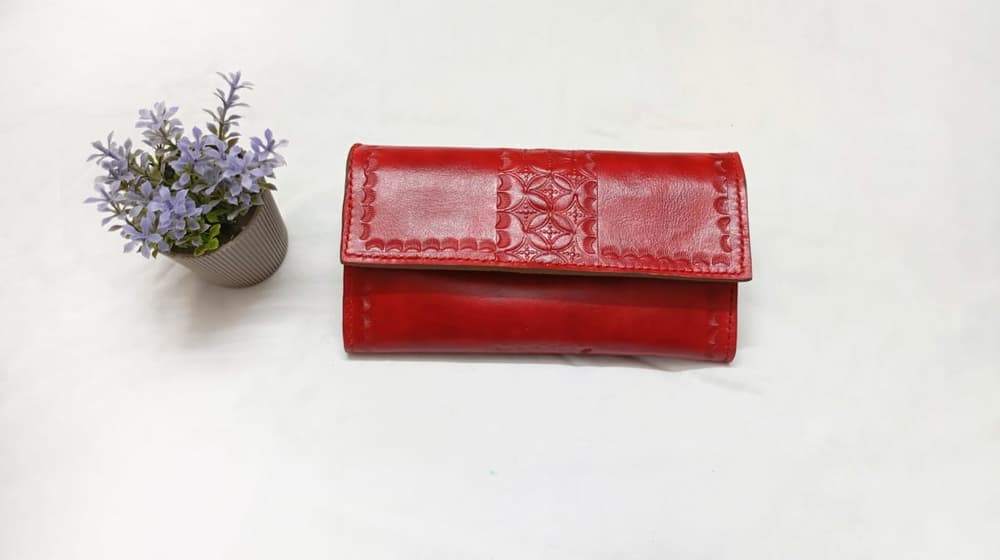 Red color wallet with hand engraving