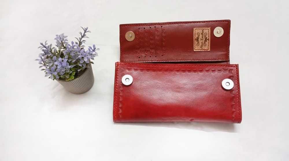 Red color wallet with hand engraving