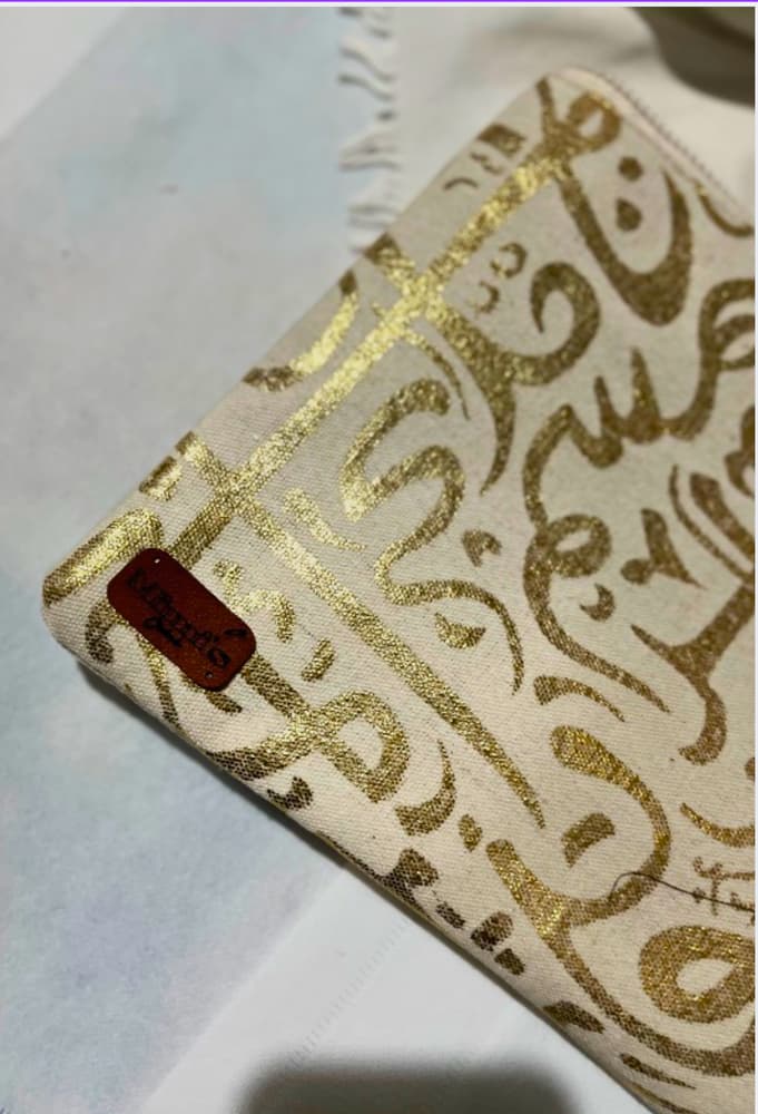 Calligraphy clutch 